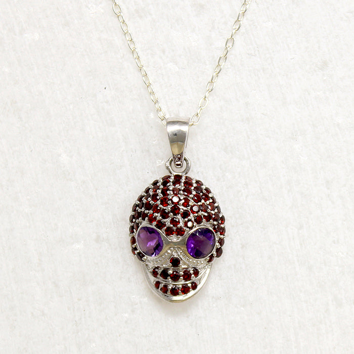 Garnet Studded Sterling Silver Artisan Skull Pendant