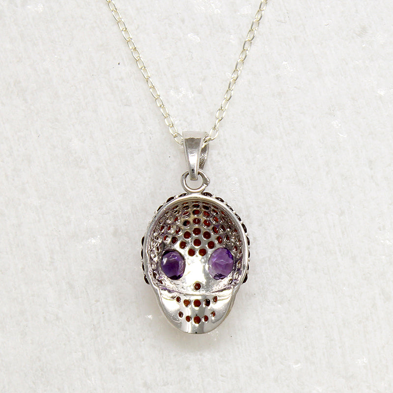 Garnet Studded Sterling Silver Artisan Skull Pendant
