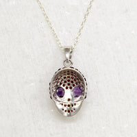 Garnet Studded Sterling Silver Artisan Skull Pendant