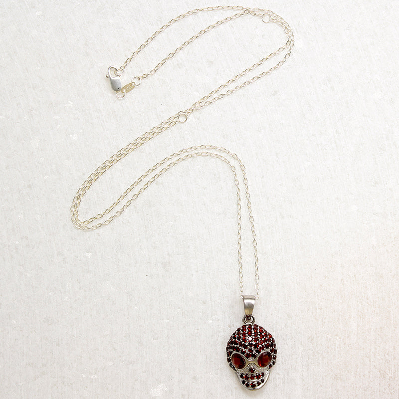 Garnet Studded Sterling Silver Artisan Skull Pendant