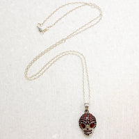 Garnet Studded Sterling Silver Artisan Skull Pendant