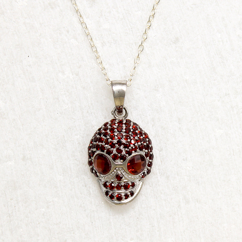 Garnet Studded Sterling Silver Artisan Skull Pendant