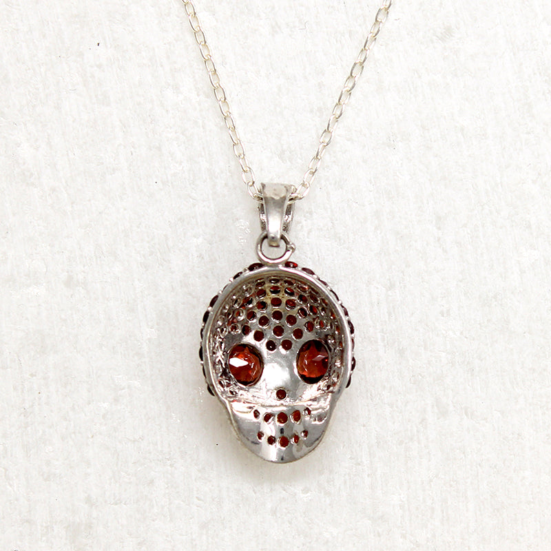 Garnet Studded Sterling Silver Artisan Skull Pendant