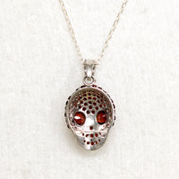 Garnet Studded Sterling Silver Artisan Skull Pendant