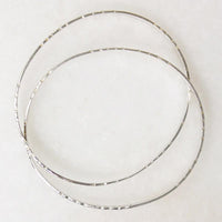 Two Slim Sterling Bangles with Hawaiian Pua Kala Flowers