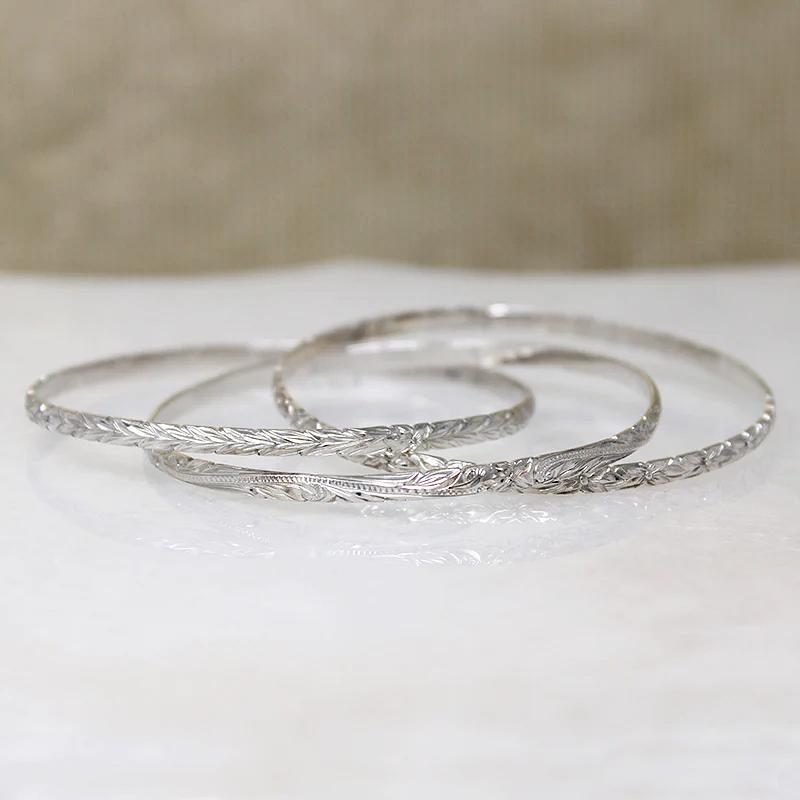Set of Three Sterling Bangles with Hawaiian Pua Kala Flowers