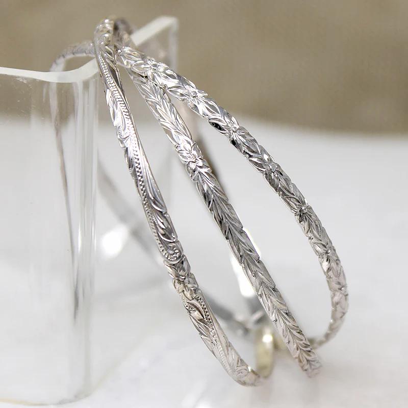 Set of Three Sterling Bangles with Hawaiian Pua Kala Flowers