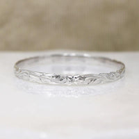 Slender Hawaiian Pua Kala Flower .22" Sterling Bangle