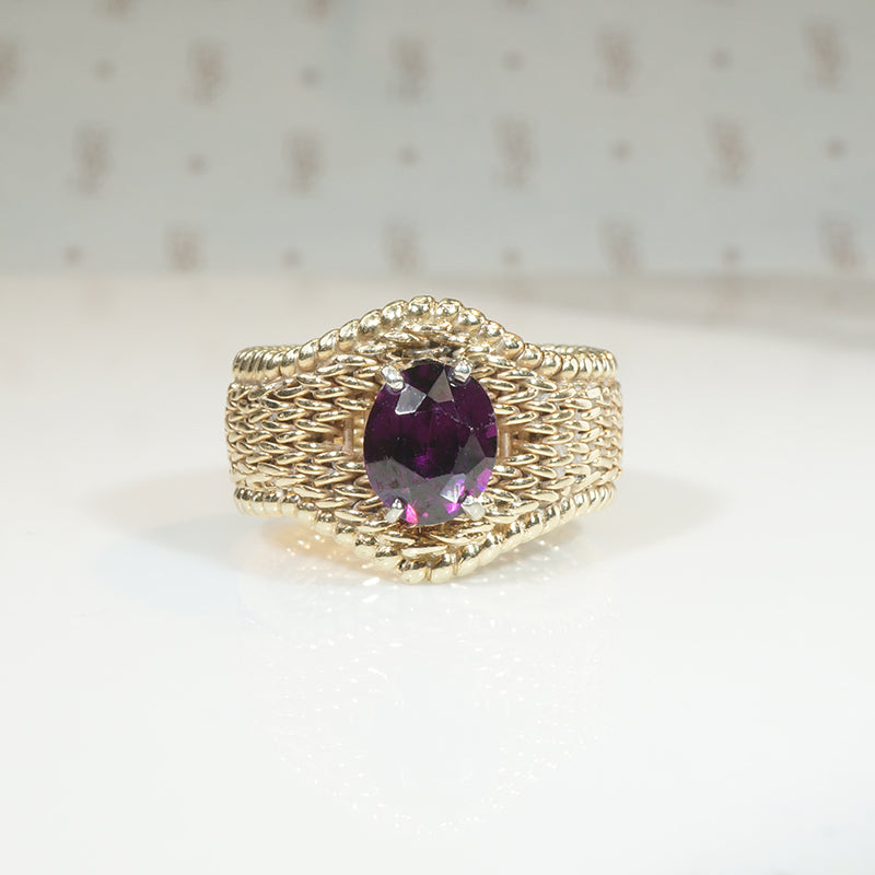 Beautifully Woven Gold Ring with Garnet