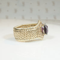 Beautifully Woven Gold Ring with Garnet