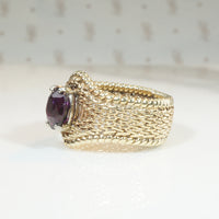 Beautifully Woven Gold Ring with Garnet
