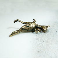 I'm a 9k Gold Roadrunner Charm Honey