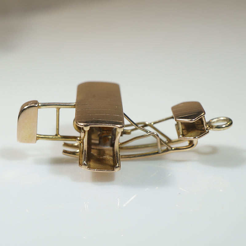 Biplane Charm Modeled in 14k Gold