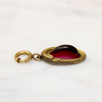 Sly Serpent Pendant with Sugar Loaf Garnet