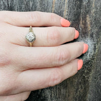 Subtle Two Tone Filigree Diamond Engagement Ring
