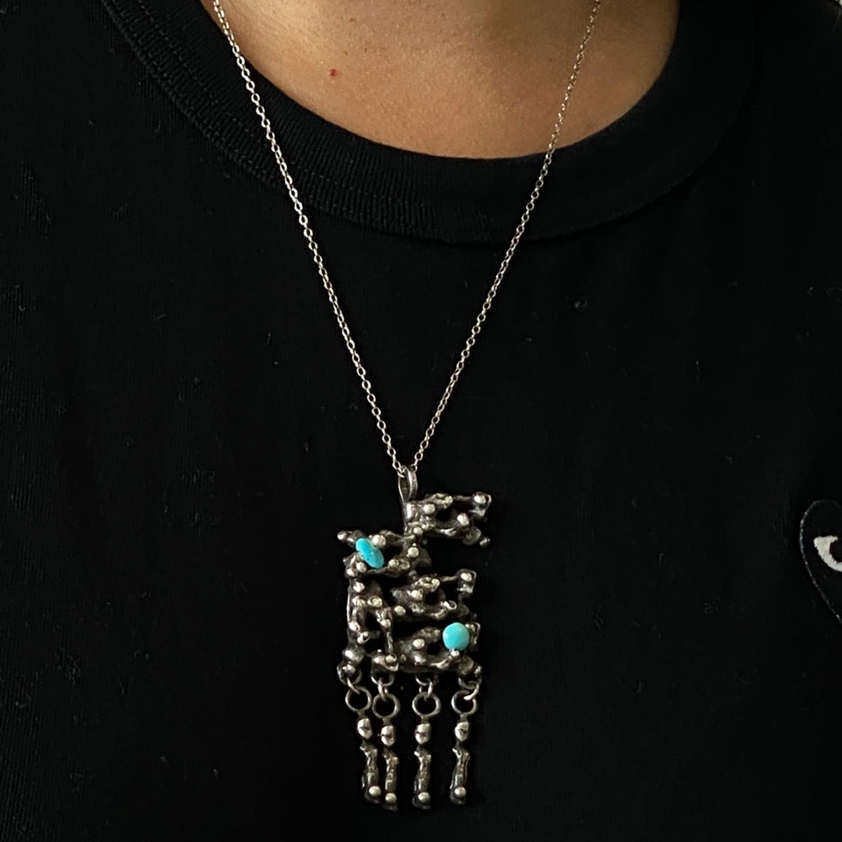 Fascinating Modernist Pendant in Silver & Turquoise