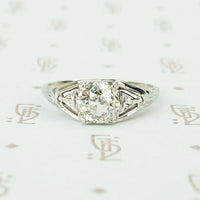 1.12 carat oec diamond filigree engagement ring in 18k white gold