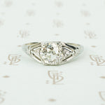 1.12 carat oec diamond filigree engagement ring in 18k white gold