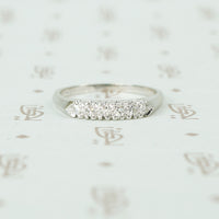 14k white gold 6 diamond band with knife edge and fish tail details circa 1940