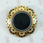 banded agate locket brooch in 18k with enameled flowers in black and white circa 1860