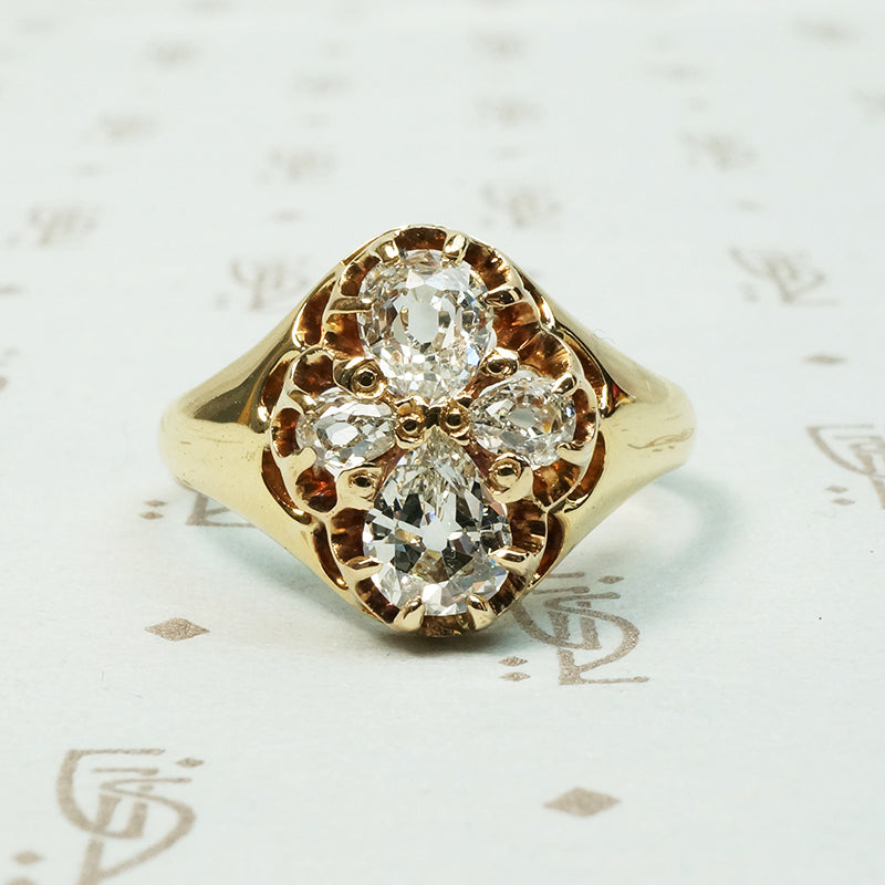Old mine cut pear shaped diamond ring set in quatréfoil pattern 18k yellow gold circa 1880