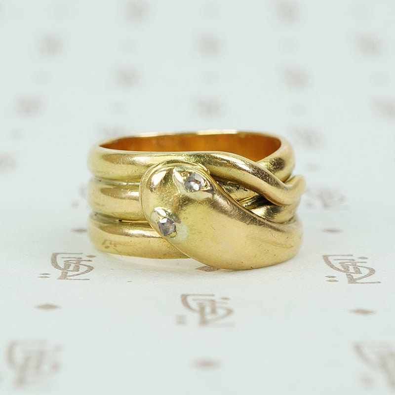 antique 18k yellow gold wide coiled snake ring with rose cut diamond eyes