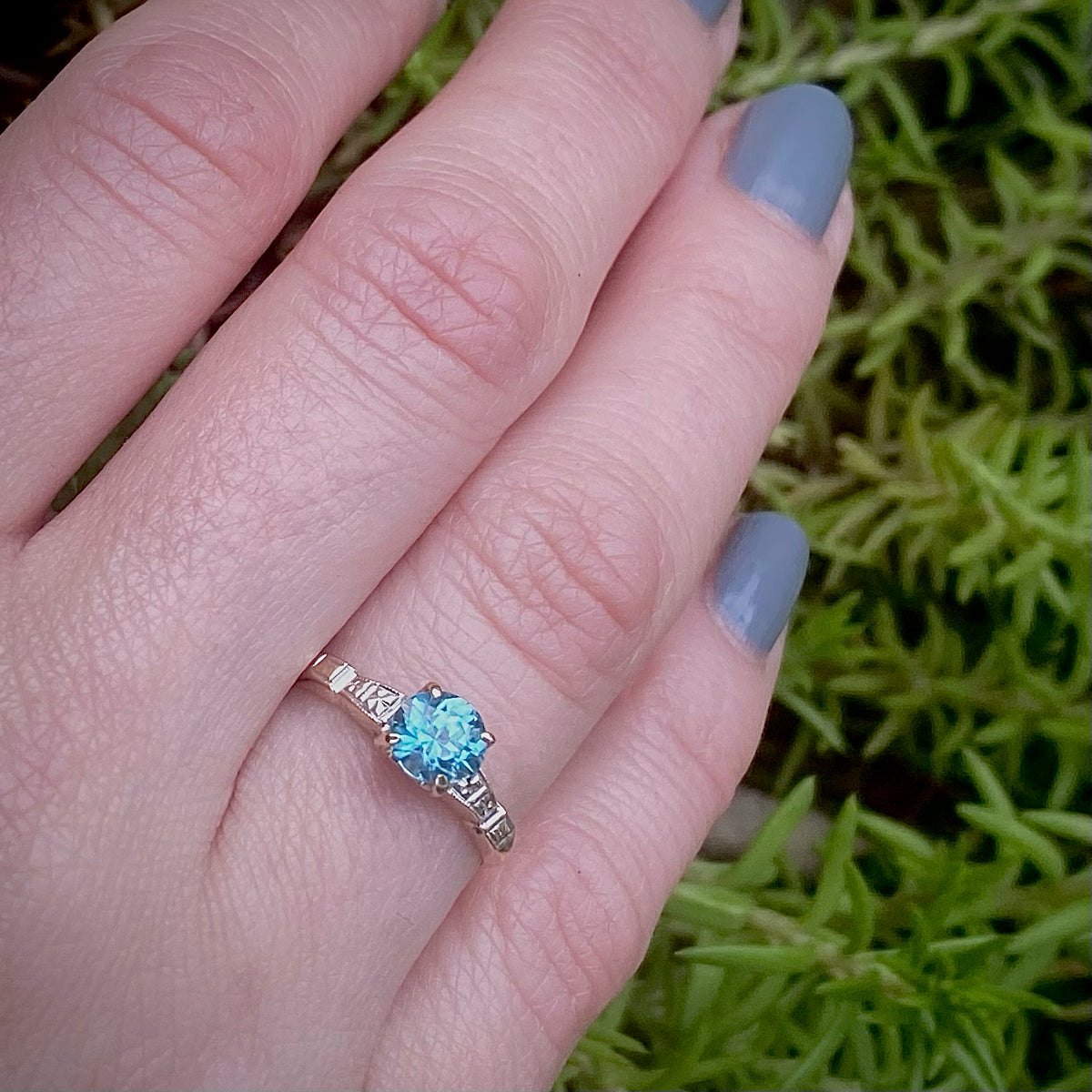 Natural Blue Zircon Solitaire with Hearts & Flowers