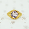 buff top amethyst set in 22k yellow gold belcher setting circa 1890