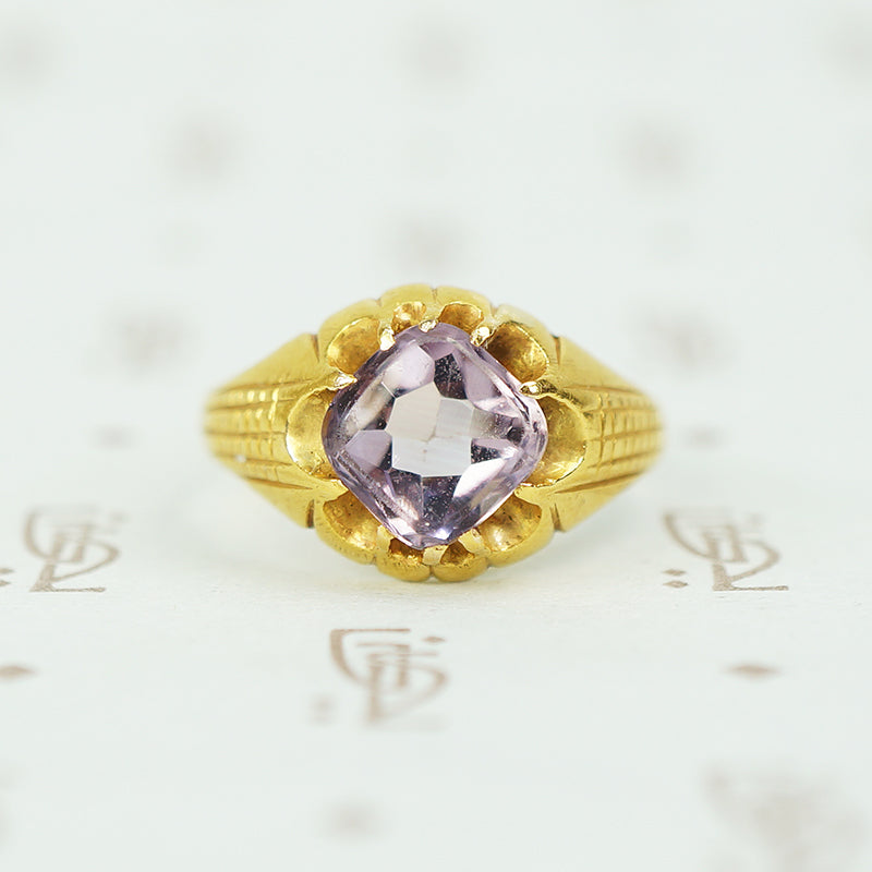 buff top amethyst set in 22k yellow gold belcher setting circa 1890