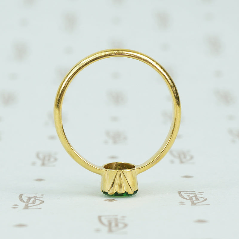 22k recycled gold and tsavorite garnet ring bezel detail