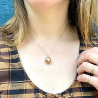 Unusual Hinged Ball Locket