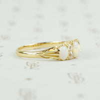 side view antique opal and diamond ring