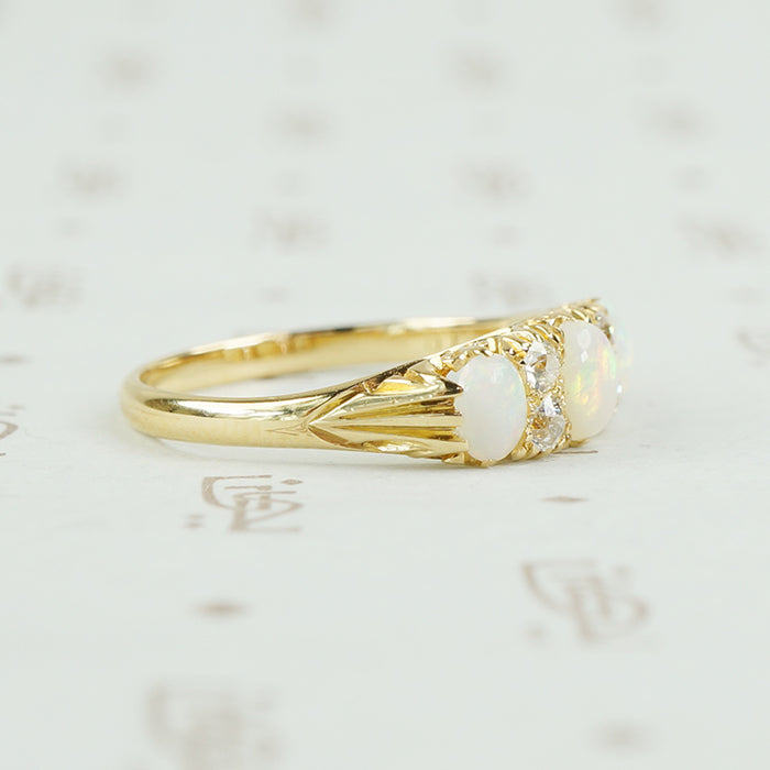 side view antique opal and diamond ring