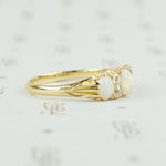 side view antique opal and diamond ring