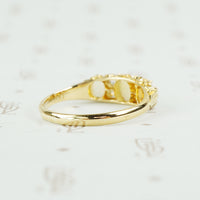 back of opal and diamond ring