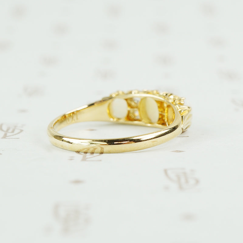 back of opal and diamond ring