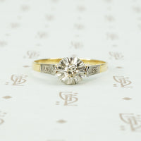 platinum and 18k yellow gold engagement ring with fluted head