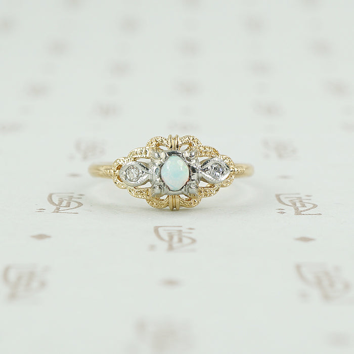 2 tone gold opal and diamond ring
