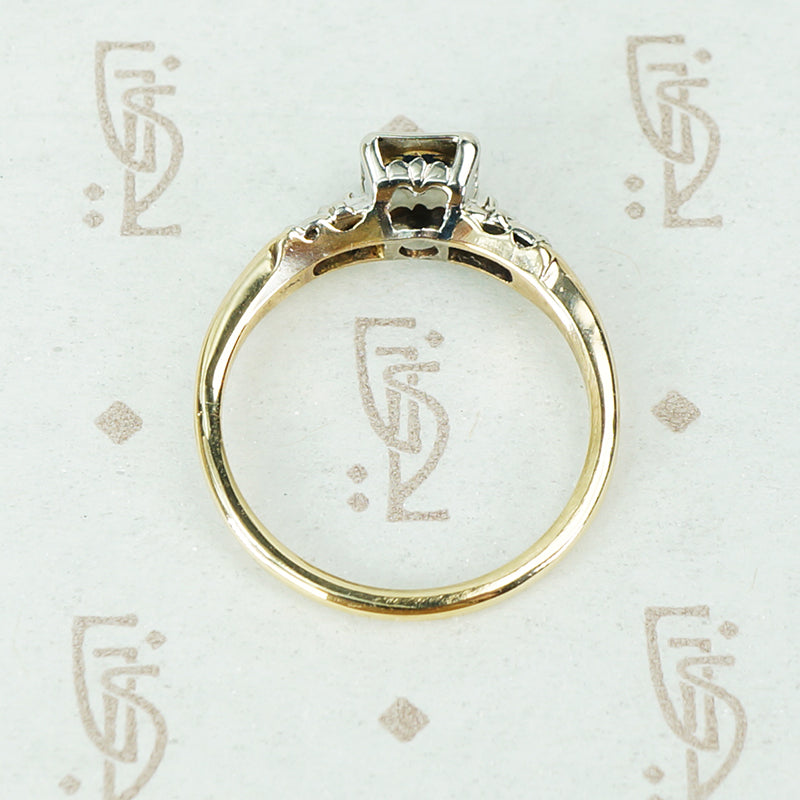 2 tone white and yellow gold 1940's engagement ring with sapphire and side diamonds