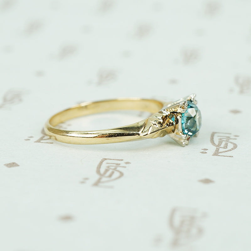 1/2 carat natural blue zircon in 2 tone 14k gold setting vintage engagement ring side view