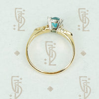 1/2 carat natural blue zircon in 2 tone 14k gold setting vintage engagement ring