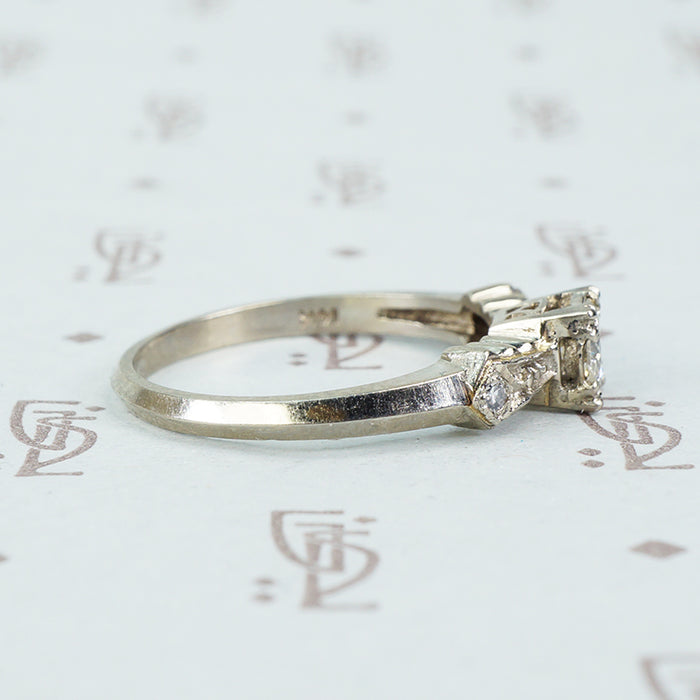 1940's white gold bow tie diamond engagement ring side view