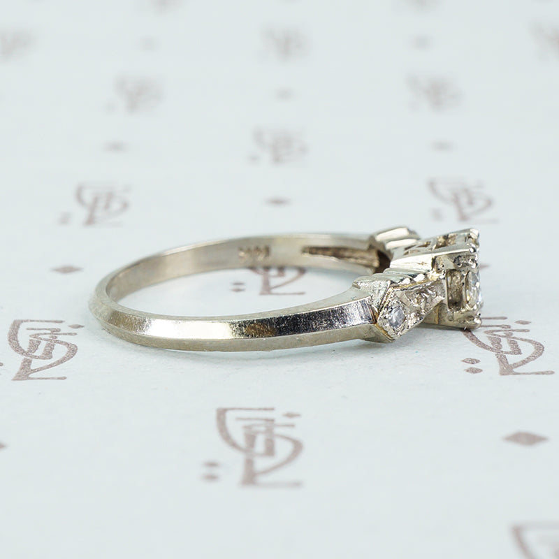 1940's white gold bow tie diamond engagement ring side view
