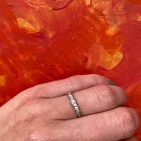 Seven Diamond White Gold Wedding Band
