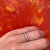 Seven Diamond White Gold Wedding Band
