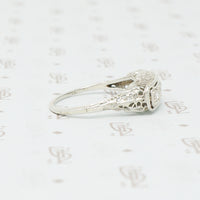 3 diamond filigree white gold ring side view