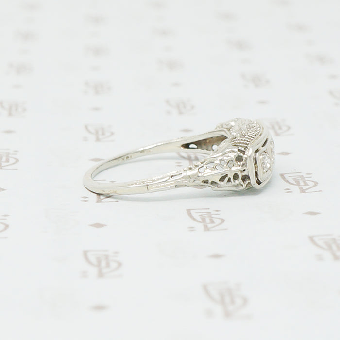 3 diamond filigree white gold ring side view