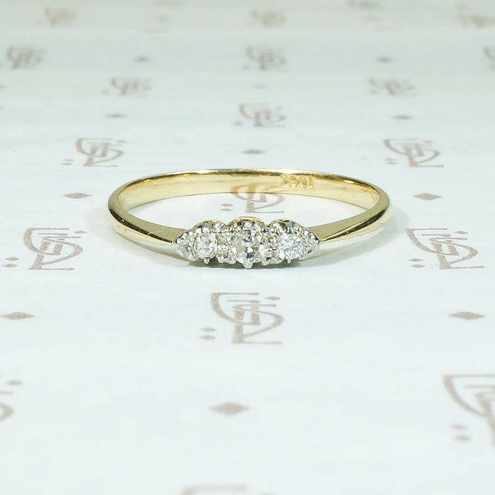 Delicate Three Diamond Wedding Band