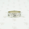 wide white gold band with forget me nots