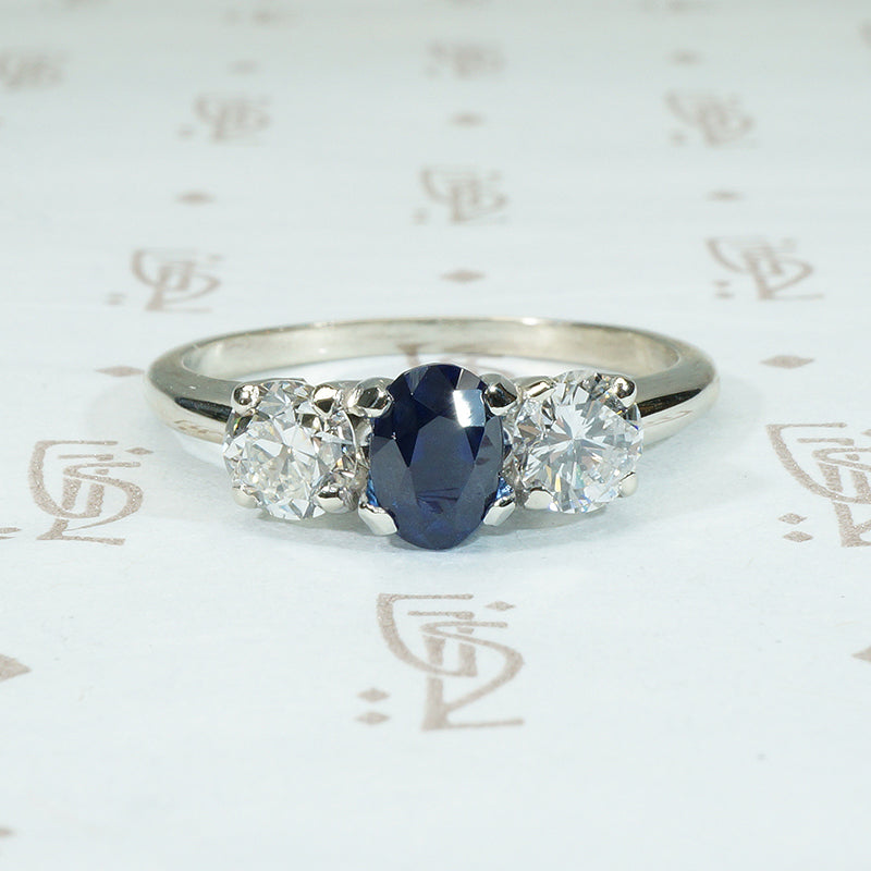 18k white gold sapphire and diamond 3 stone ring